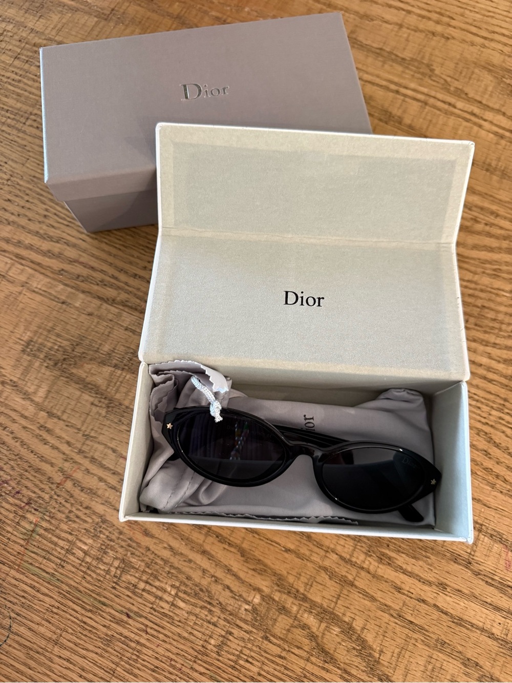 Dior Black Oval Sunglasses with Gold Star Accents - Picture 2 of 11